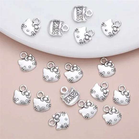 Sanrio, Jewelry, 24 Pieces Silver Hello Kitty Charm Lot Sanrio 76 7